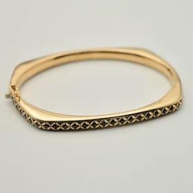 دستبند النگویی طلا 18 عیار زنانه مدل سیاه قلم 01